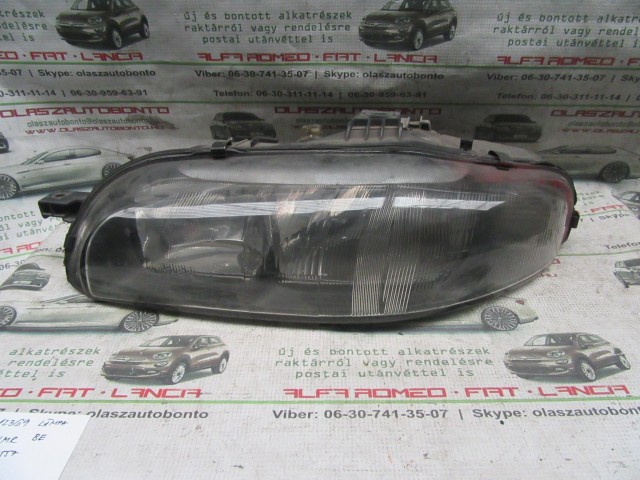 12369 Bravo/Brava 88201557 számú, bal első lámpa a képen látható sérüléssel