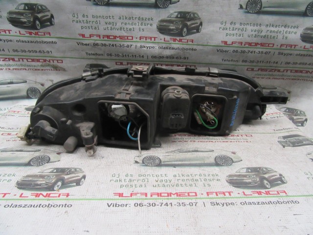 12380 Bravo/Brava 88201557 számú, bal első lámpa a képen látható sérüléssel