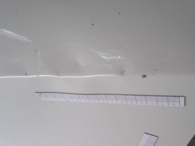 18965 Alfa Romeo Giulietta fehér színű,bal  hátsó ajtó a képen látható sérüléssel