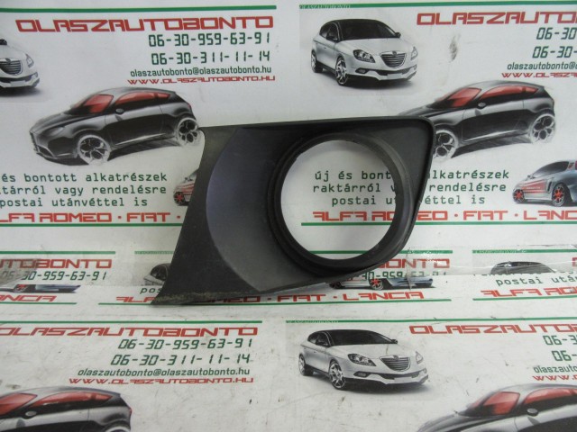 Alfa Romeo 159 156057615 számú,bal első ködlámpa keret a képen látható sérüléssel