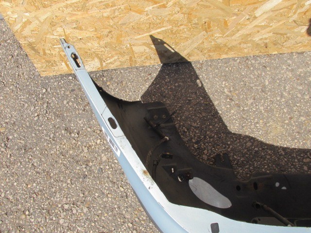 91417 Fiat Marea világos kék színű, fényszórómosó helyes első lökhárító 