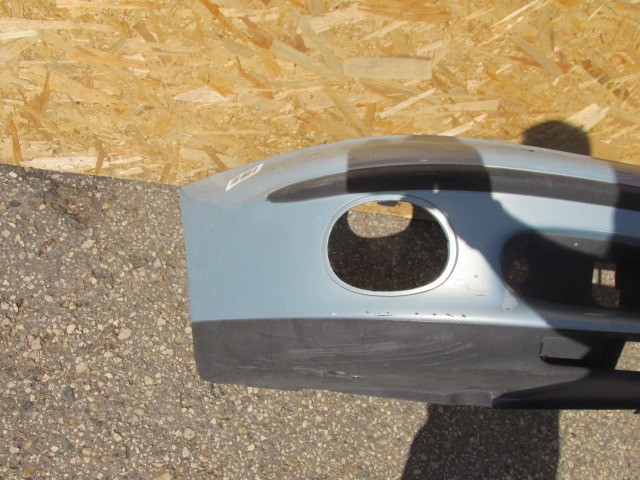 91417 Fiat Marea világos kék színű, fényszórómosó helyes első lökhárító 