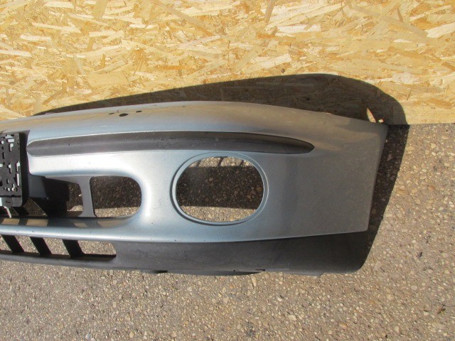 91417 Fiat Marea világos kék színű, fényszórómosó helyes első lökhárító 