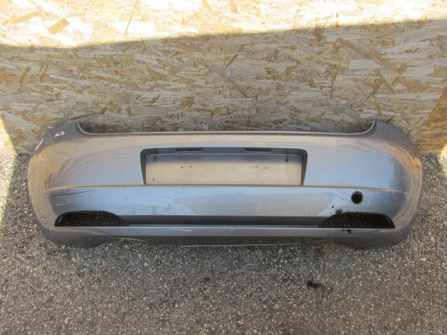 94104 Fiat Grande Punto ezüst színű hátsó lökhárító, a képen látható sérüléssel  71777606