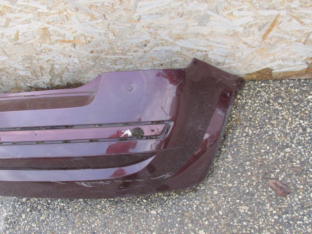 92847 Fiat Stilo 5 ajtós bordó színű hátsó lökhárító, a képen látható sérüléssel 2001-2003