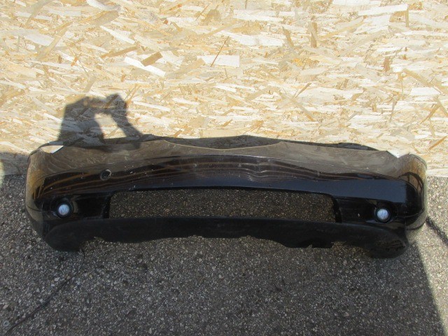 94092 Lancia Thesis fekete színű, fényszórómosó helyes első lökhárító 