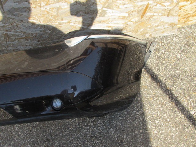 94092 Lancia Thesis fekete színű, fényszórómosó helyes első lökhárító 