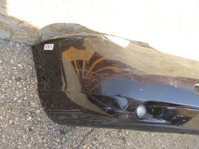 94092 Lancia Thesis fekete színű, fényszórómosó helyes első lökhárító 