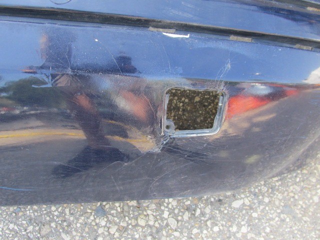 94137 Fiat Stilo 5 ajtós, indigókék színű hátsó lökhárító 2003-2007, a képen látható sérüléssel