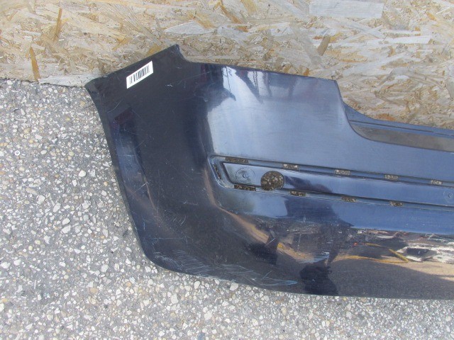 94137 Fiat Stilo 5 ajtós, indigókék színű hátsó lökhárító 2003-2007, a képen látható sérüléssel