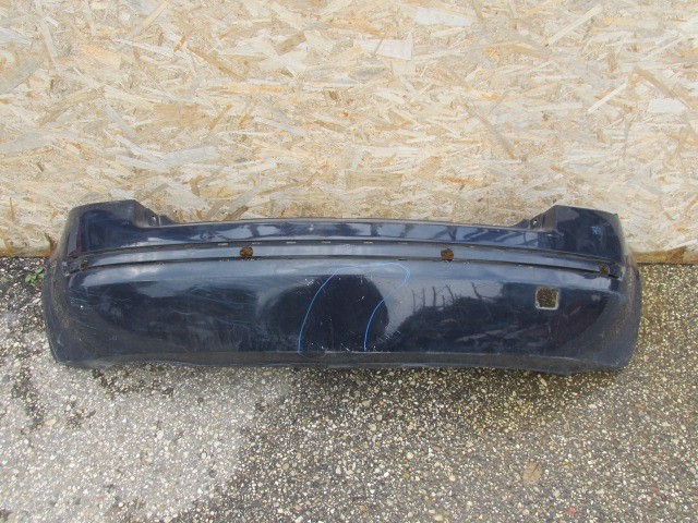 92840 Fiat Stilo 5 ajtós, indigókék színű hátsó lökhárító 2003-2007, a képen látható sérüléssel