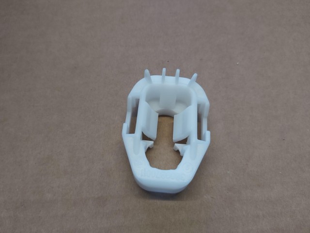 Fék munkahenger tengelyt rögzítő műanyag