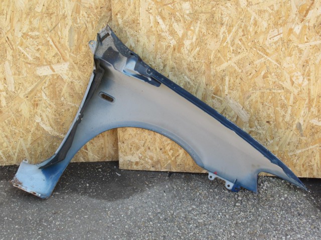 107406 Fiat Stilo 5 ajtós bal első sárvédő a képen látható sérüléssel 46762219