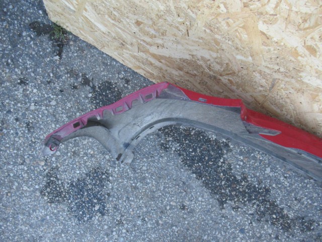 107430 Alfa Romeo MiTo hátsó lökhárító a képen látható sérüléssel 