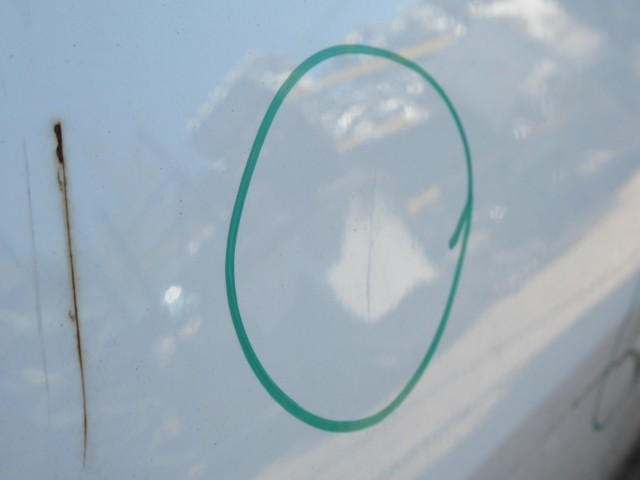 111133 Fiat Linea jobb első ajtó a képen látható sérüléssel