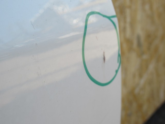 111133 Fiat Linea jobb első ajtó a képen látható sérüléssel