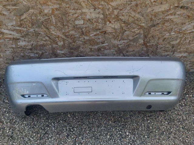 121016 Alfa Romeo 156 szedán 2003-2005 hátsó lökhárító, a képen látható sérüléssel