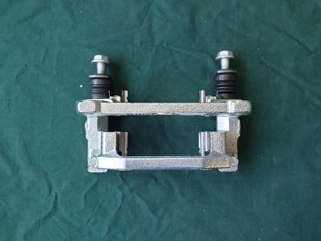 Fiat Stilo gyári új hátsó fékmunkahenger tartó konzol 77366031