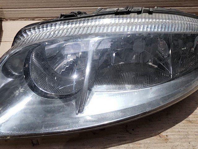 162403 Alfa Romeo GT 2003-2010 bal első fényszóró, a képen látható sérüléssel, törött rögzítő fülek!!!!