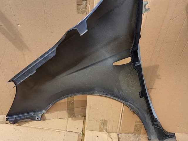 Hyundai i20 2008-2012 jobb első sárvédő a képen látható sérüléssel