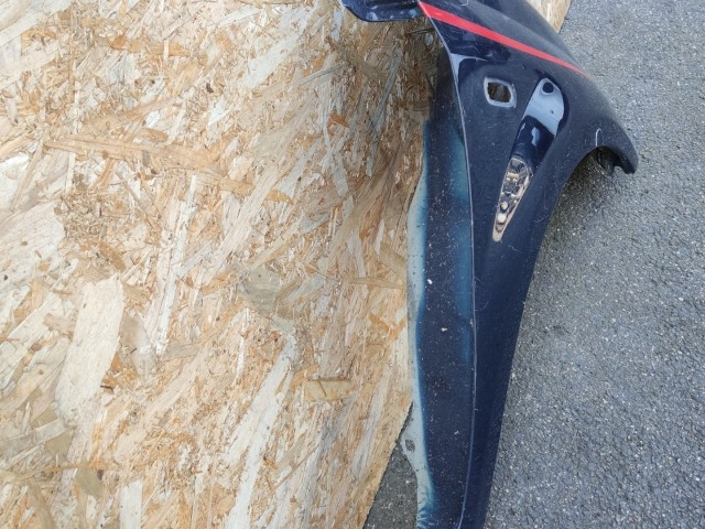 168161 Fiat Grande Punto jobb első sárvédő, a képen látható sérüléssel 51901100