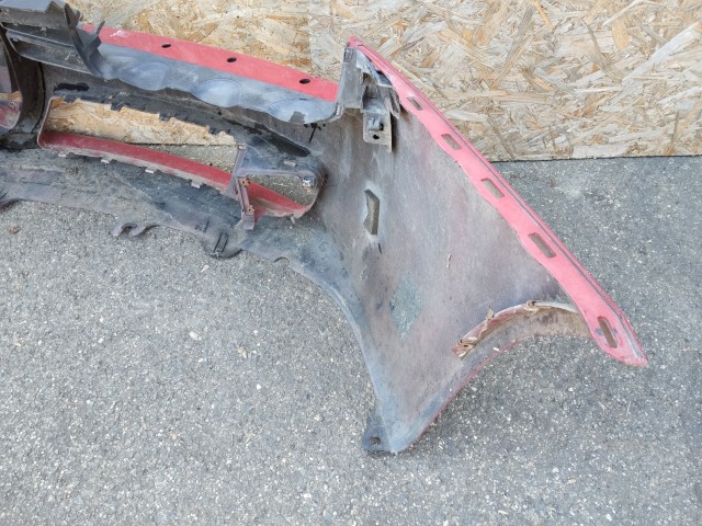 168645 Alfa Romeo 159 fényszórómosó helyes első lökhárító, a képen látható sérüléssel