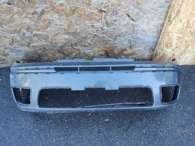 91435 Fiat Punto III. 2003-2010 szürke színű első lökhárító, a képen látható sérüléssel