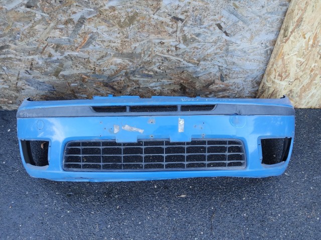 172969 Fiat Punto III. 2003-2010 kék színű első lökhárító, a képen látható sérüléssel