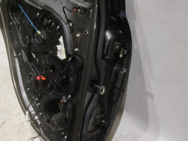 166452 Alfa Romeo Giulietta 2010-2020 grafitszürke színű bal hátsó ajtó,a képen látható sérüléssel 50509299