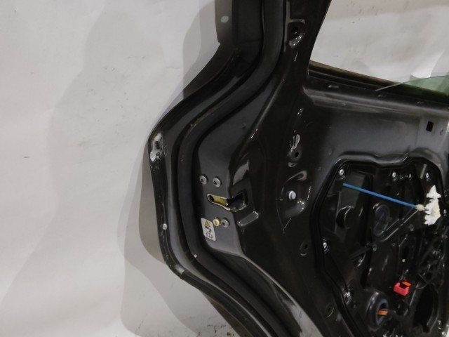 166452 Alfa Romeo Giulietta 2010-2020 grafitszürke színű bal hátsó ajtó,a képen látható sérüléssel 50509299