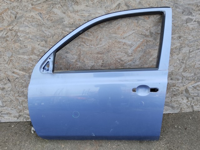 179521 Nissan Micra 2002-2010 bal első ajtó, a képen látható sérüléssel