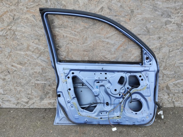 179521 Nissan Micra 2002-2010 bal első ajtó, a képen látható sérüléssel
