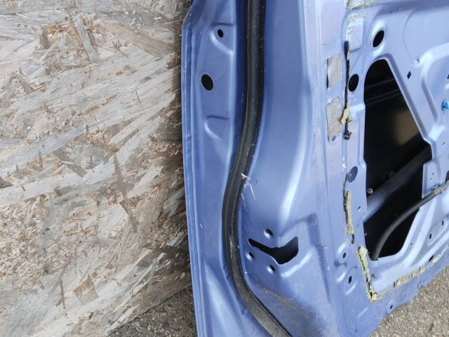 179521 Nissan Micra 2002-2010 bal első ajtó, a képen látható sérüléssel