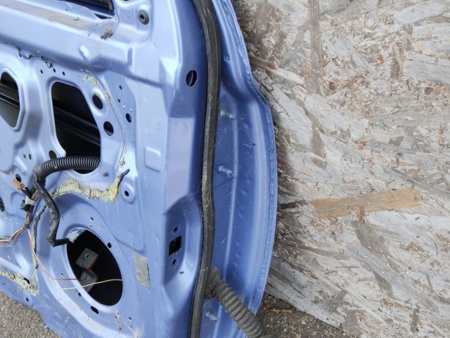 179521 Nissan Micra 2002-2010 bal első ajtó, a képen látható sérüléssel