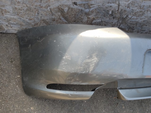 136191 Alfa Romeo GT 2003-2010 hátsó Lökhárító, a képen látható sérüléssel