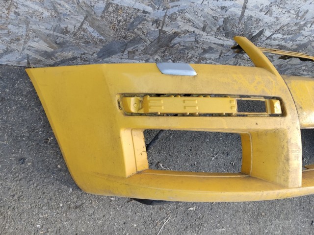 181051 Fiat Stilo 2001-2007 3 ajtós fényszórómosós első lökhárító, fényszórómosó fejekkel