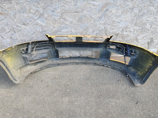 181051 Fiat Stilo 2001-2007 3 ajtós fényszórómosós első lökhárító, fényszórómosó fejekkel