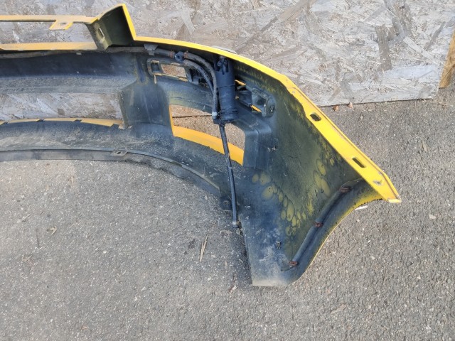 181051 Fiat Stilo 2001-2007 3 ajtós fényszórómosós első lökhárító, fényszórómosó fejekkel