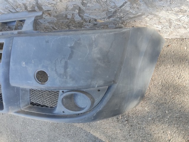 181061 Fiat Doblo 2005-2009 első lökhárító, a képen látható sérüléssel 735417815