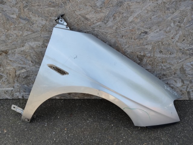 184593 Lancia Delta 2008-2014 jobb első sárvédő, a képen látható sérüléssel