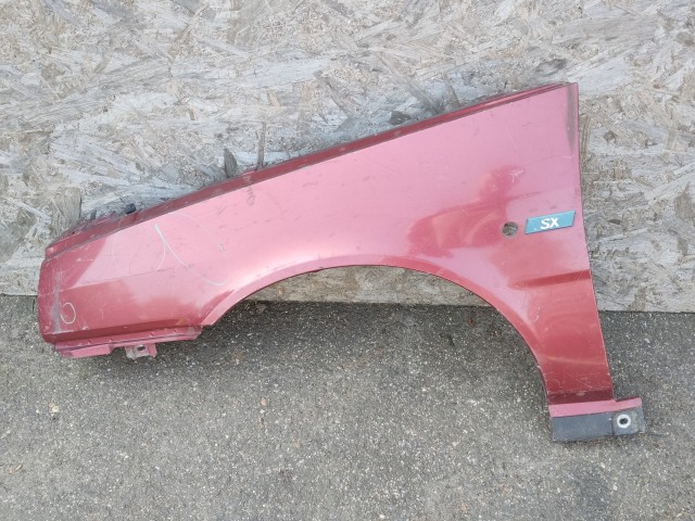 187789 Fiat Tipo 1989-1995 1989-1995 Sárvédő Használt Bal első Bordó  a képen látható sérüléssel