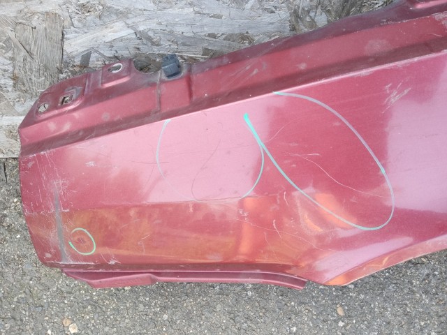 187789 Fiat Tipo 1989-1995 1989-1995 Sárvédő Használt Bal első Bordó  a képen látható sérüléssel