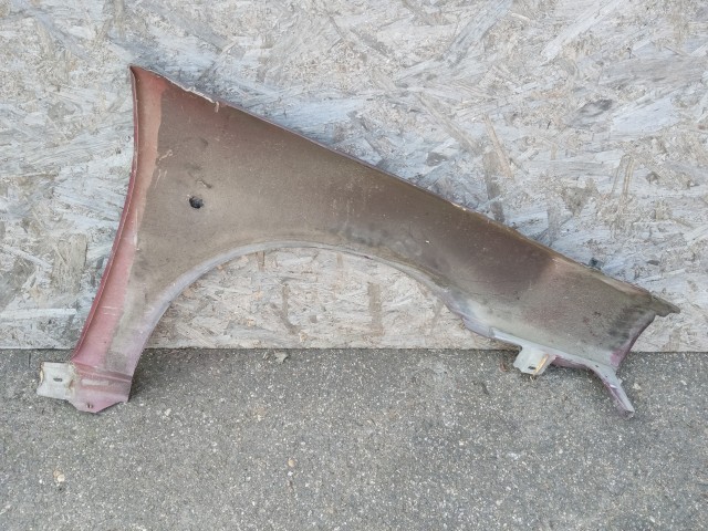 187789 Fiat Tipo 1989-1995 1989-1995 Sárvédő Használt Bal első Bordó  a képen látható sérüléssel