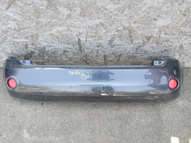 190088 Ford Fiesta 2002-2008 2002-2008 Lökhárító Használt sima hátsó Grafit  a képen látható sérüléssel