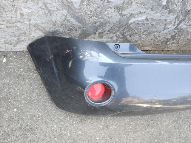 190088 Ford Fiesta 2002-2008 2002-2008 Lökhárító Használt sima hátsó Grafit  a képen látható sérüléssel