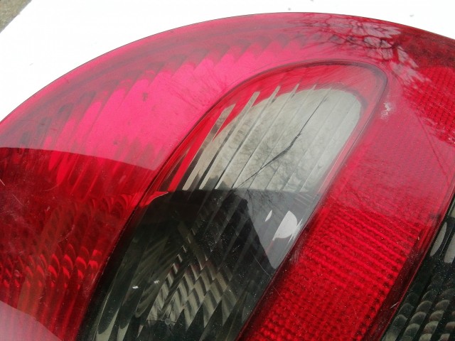 195859 Mercedes Benz A-Class(W169) 2004-2008 bal hátsó lámpa, füst színű, a képen látható sérüléssel A1698200364
