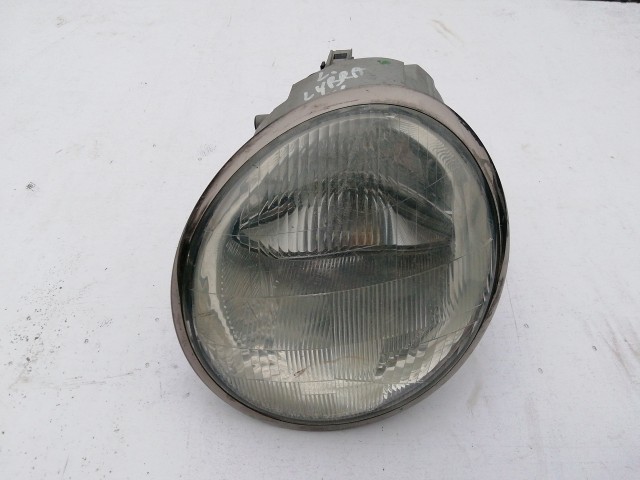 193498 Lancia Lybra 1999-2005 Lámpa , Fényszóró Használt  bal első  a képen látható sérüléssel