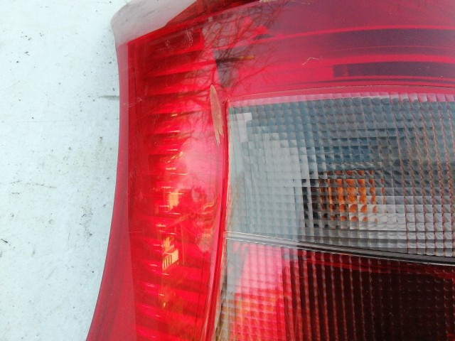 193664 Toyota Yaris II. 2006-2011 bal hátsó lámpa , a képen látható sérüléssel