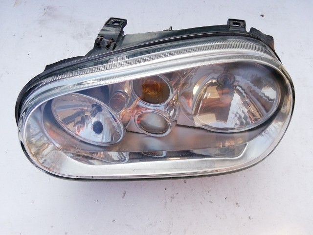 193711 Volkswagen Golf IV. 1997-2005 Lámpa , Fényszóró Használt  sima bal első  a képen látható sérüléssel