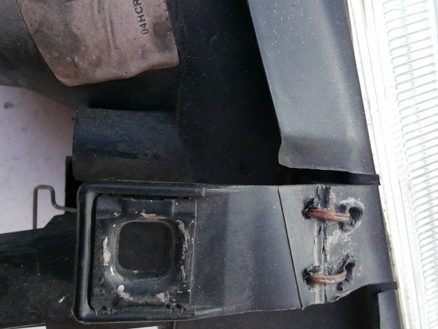 193711 Volkswagen Golf IV. 1997-2005 Lámpa , Fényszóró Használt  sima bal első  a képen látható sérüléssel